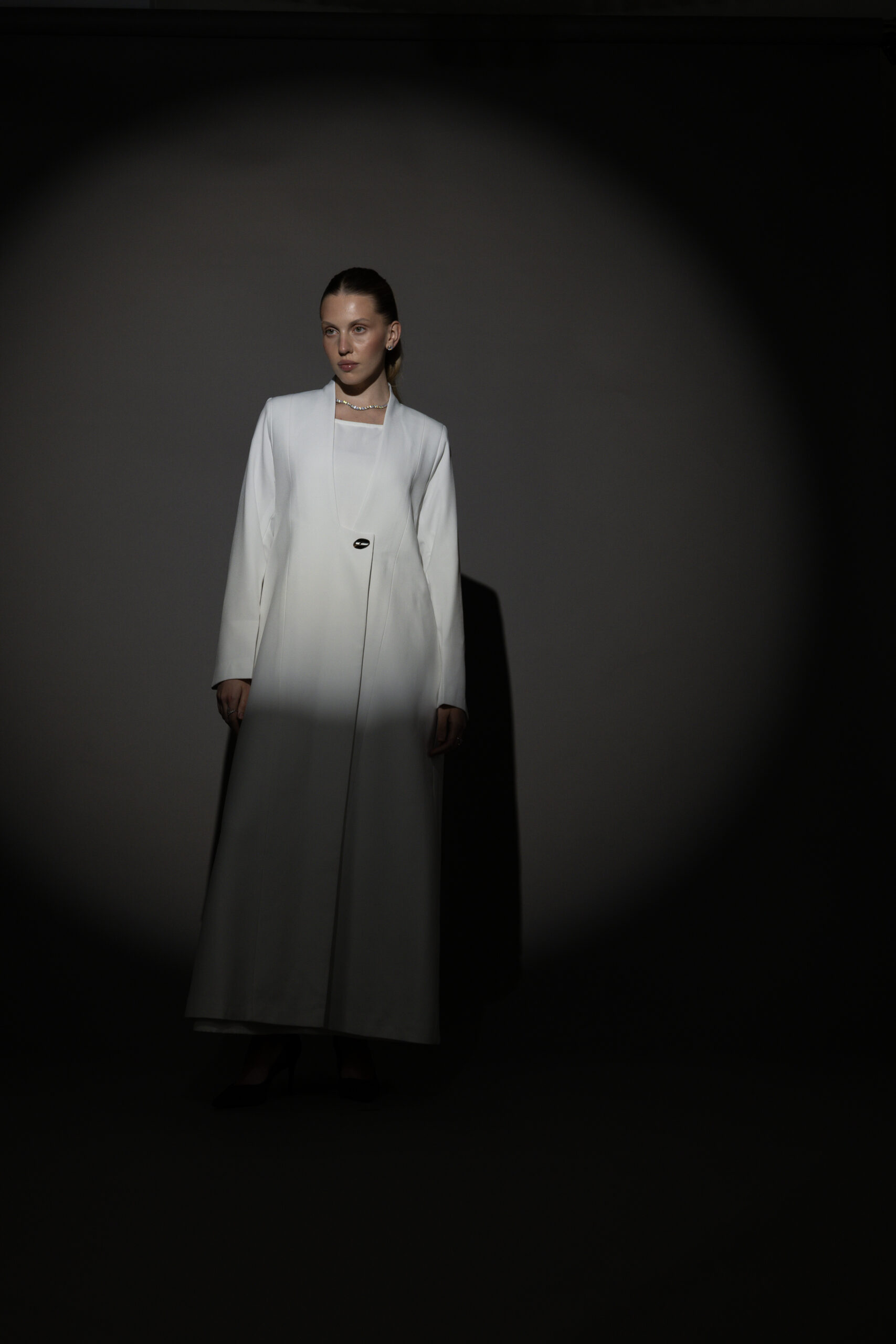 Straight Cut White Abaya with a Statement Button - Image 2