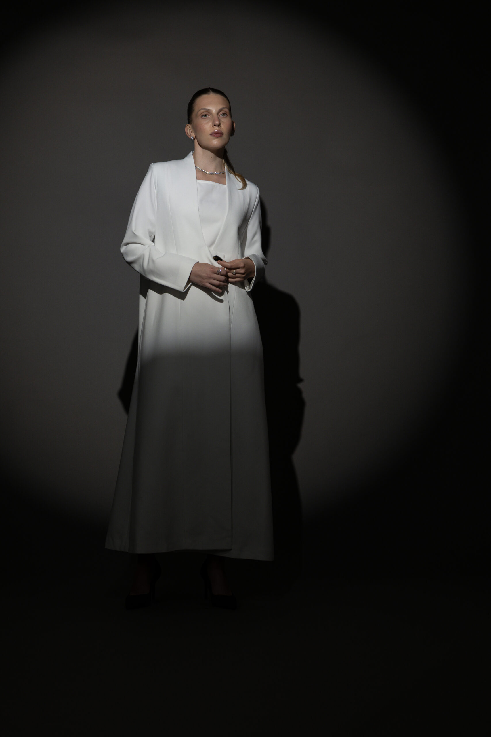 Straight Cut White Abaya with a Statement Button - Image 3