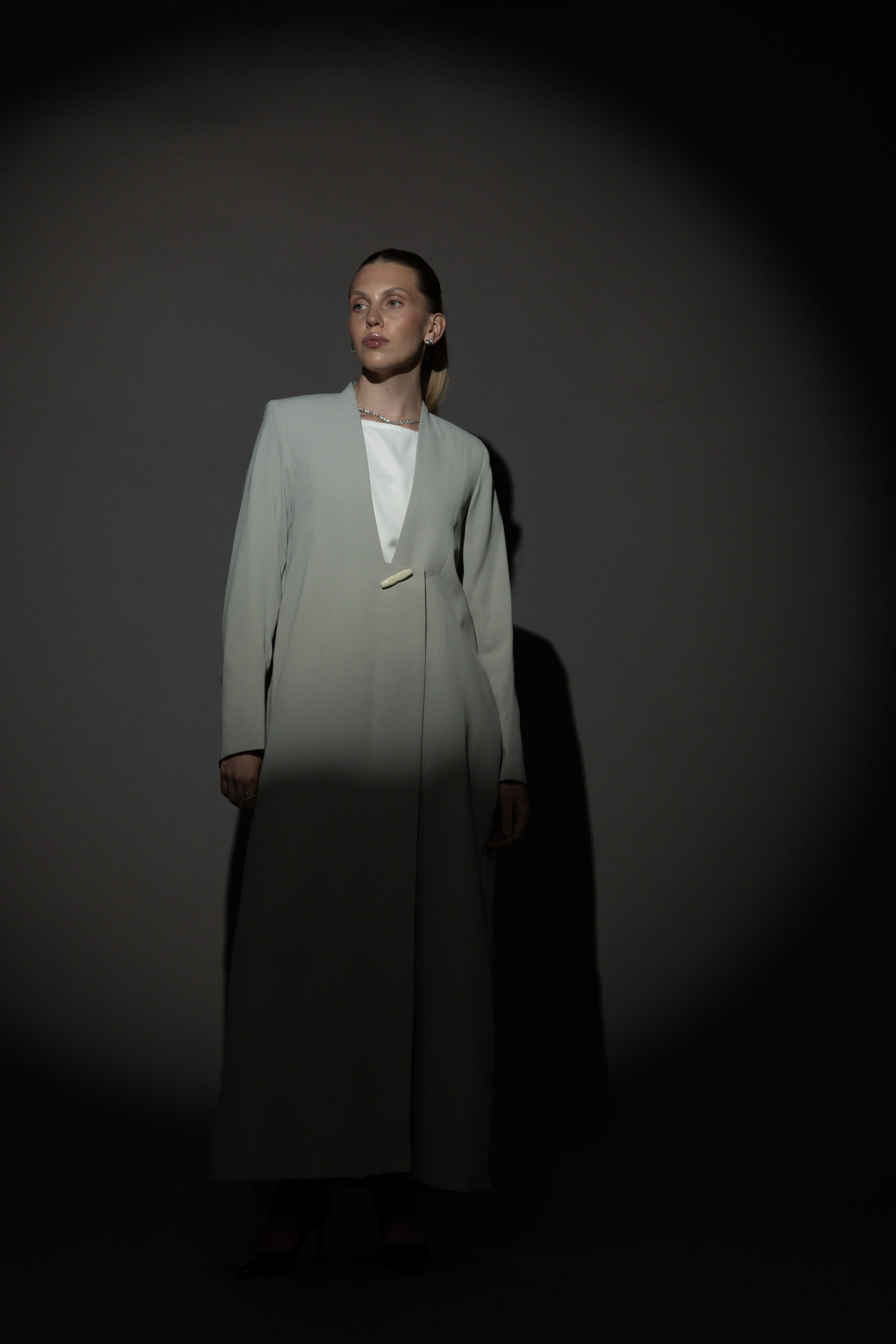 Straight Cut Light Green Abaya with a Statement Button - Image 2