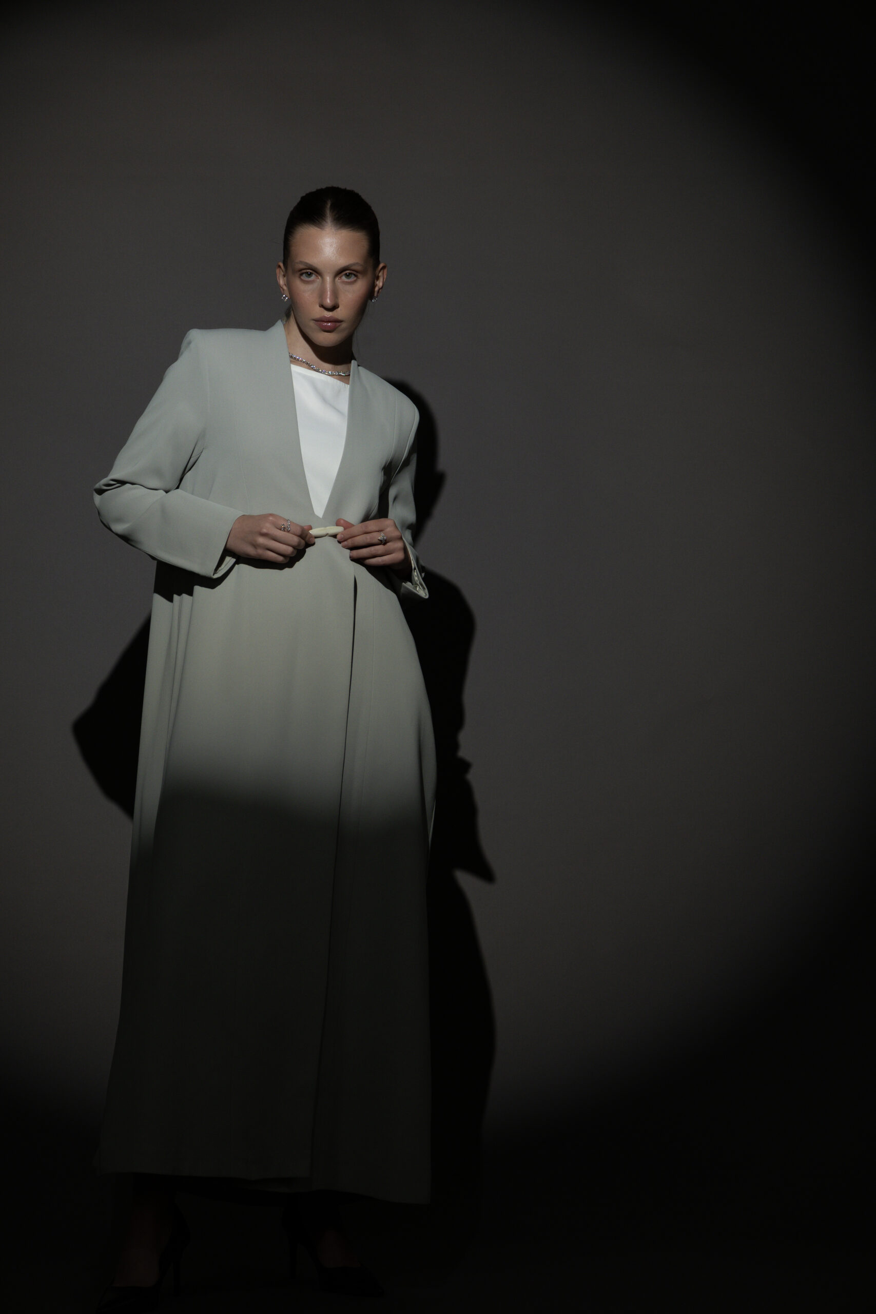 Straight Cut Light Green Abaya with a Statement Button - Image 1